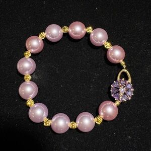 Elegant Pink and Gold Bracelet with Purple Charm